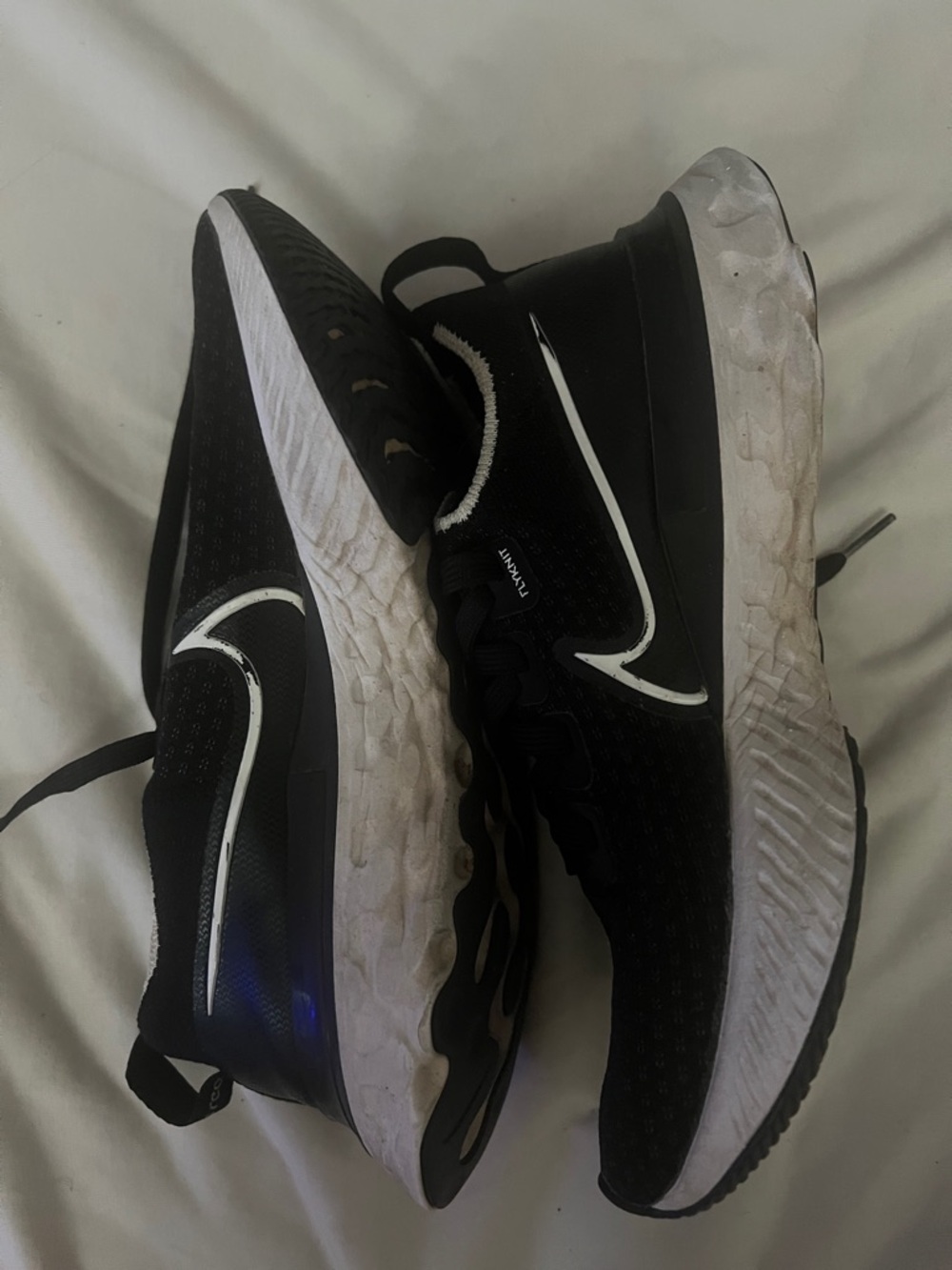 Nike Black and White Flyknit Women's Athletic Running Shoes